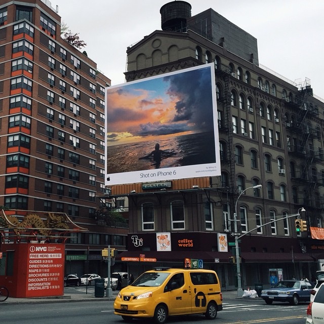 Billboard featuring photos shot using an iPhone.