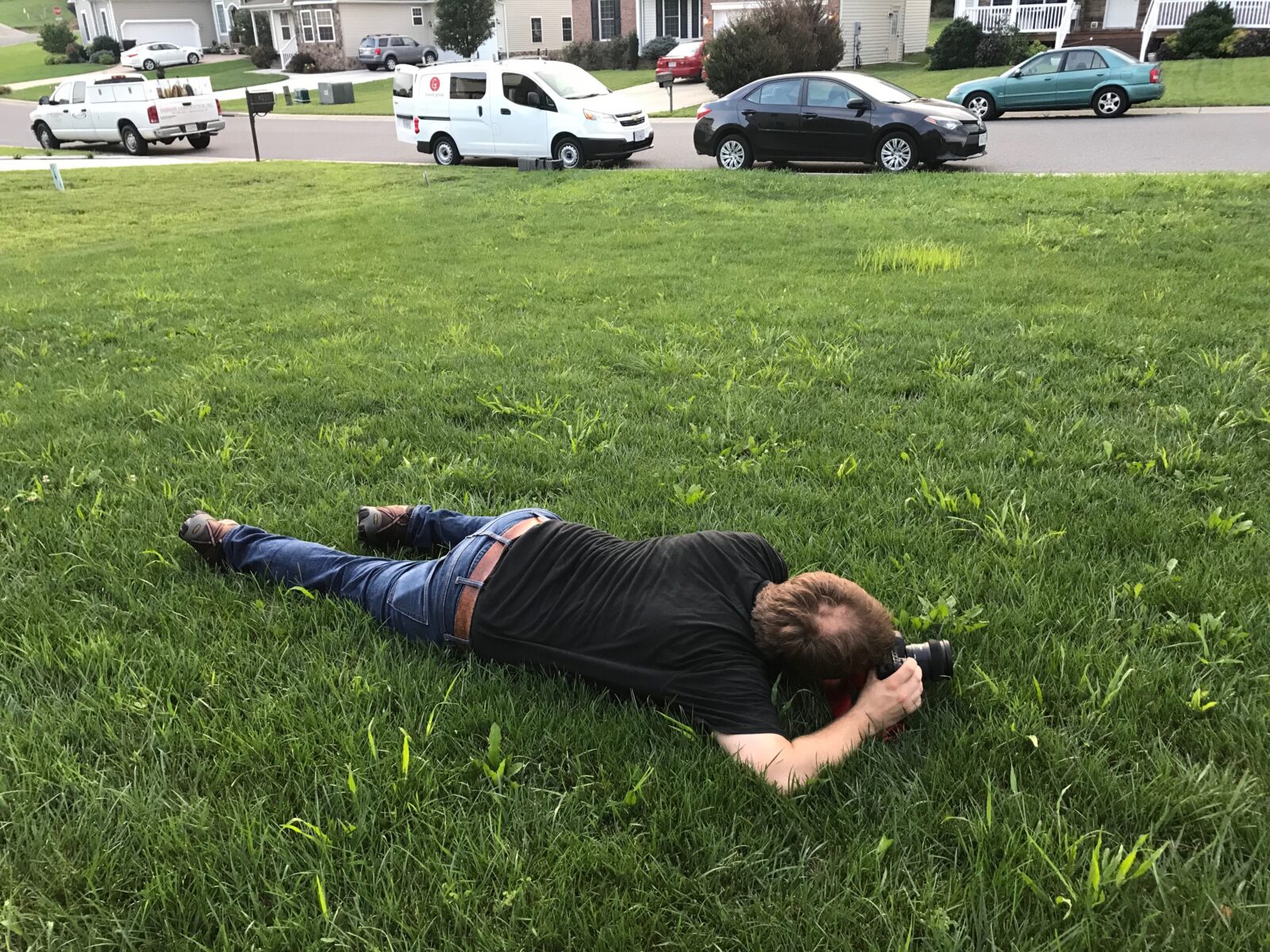 Mark on the ground with a camera, getting a unique angle at a shoot